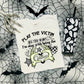 "Villain Heart Skeleton Hands Halloween Tee - Play the Victim Graphic T-Shirt"