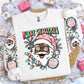 Bring some holly jolly cheer to your wardrobe with this Merry Christmas Long Sleeve Tee featuring a fun retro Santa design in soft pastel colors!