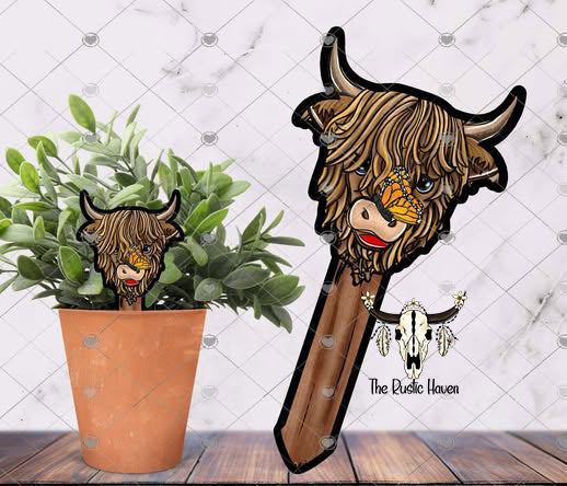 Adorable Highland cow with a butterfly on her nose plant stake